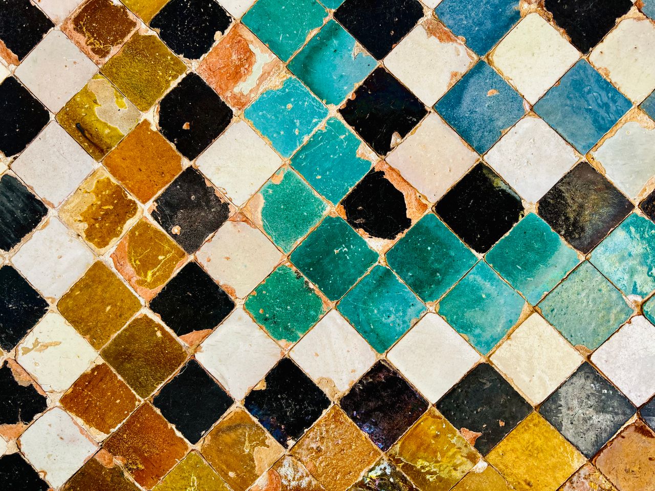 About Colorful mosaic tile pattern with geometric shapes in vibrant colors and artistic design.